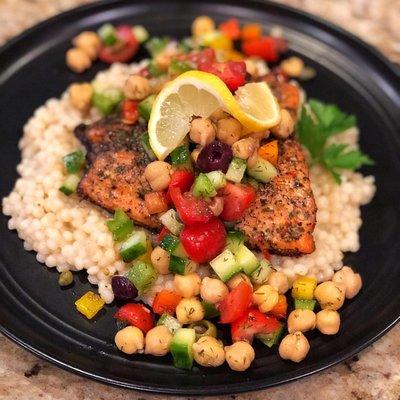 Mediterannean Salmon w/ Tomato Cucumber Slaw over Cous Cous