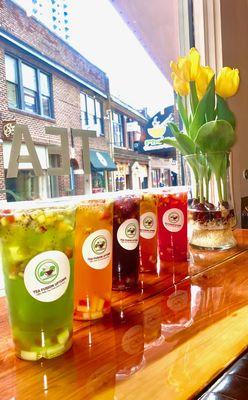 Our popular fruity tea refreshers! Freshly brewed teas with hand-diced fruits and delicious fruity jellies!