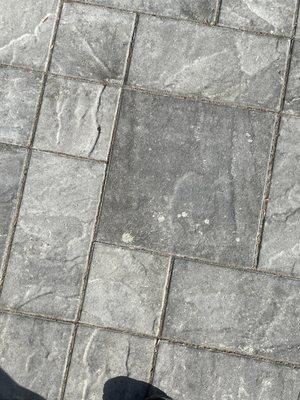 Concrete spill, damage and cracked pavers