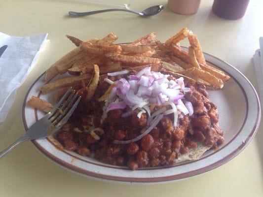 Chili cheese burger with onion and fries.  Served with a nice fry sauce.