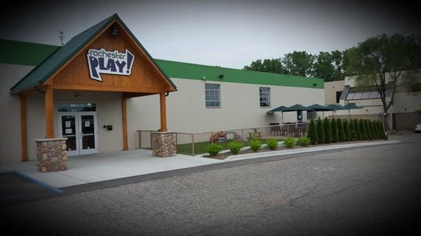 Front entrance and outdoor patio seating and play area