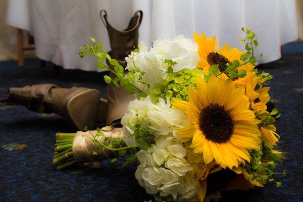 A lovely cluster bouquet of sunflowers and hydrangea for that wild flower girl! ~