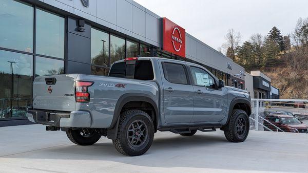 Outdoor showroom space allows shoppers to view new Nissan vehicles from all angles.