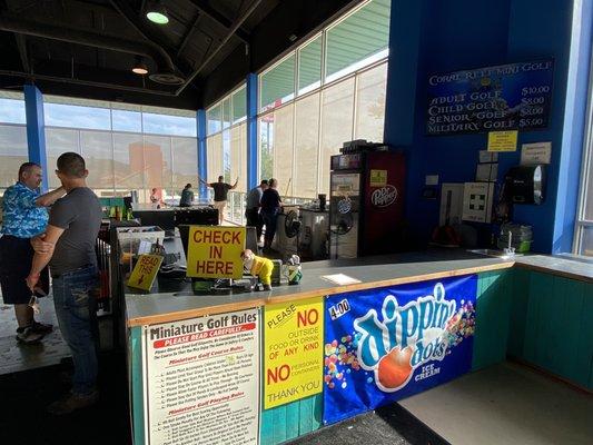 Front desk, where you can purchase some snacks like dippin dots, and drinks like, bottled soda, bottled water, coffee and hot chocolate.