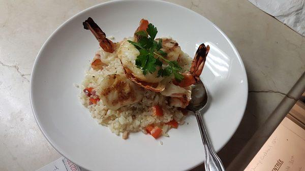 Seafood over risotto Rice