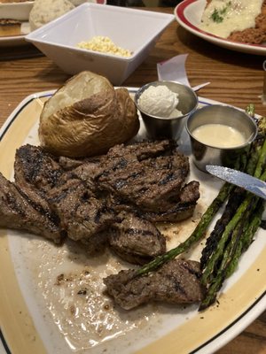 16 ounce broiled steak tips with Dijon asparagus and baked potato