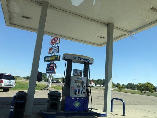 Sign and one gas pump