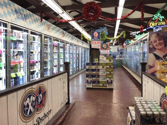 The long hall of coolers means plenty to find for a quick grab-n-go to a party.