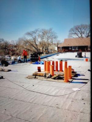 Roof install clay tile coping