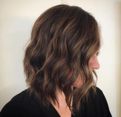 Highlights on brunette hair.