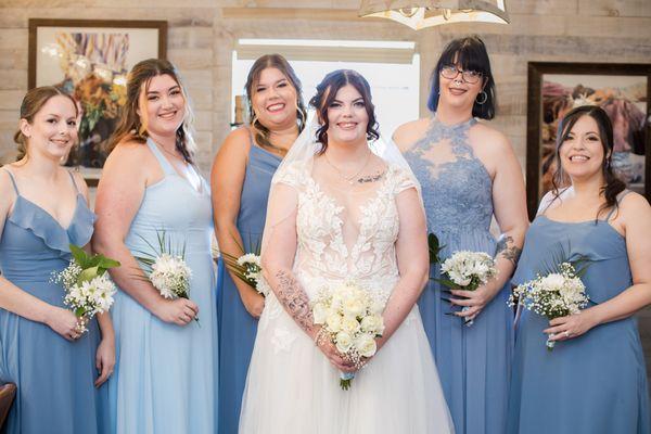 bride with her bridesmaids