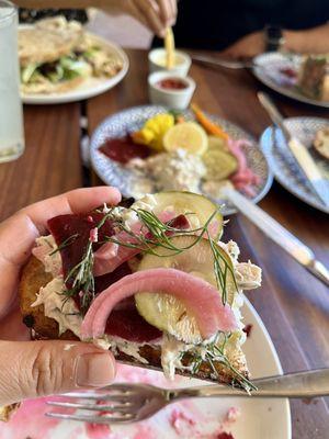 perfectly toasted fresh sourdough, house smoked trout, divine pickled beets, spicy carrots (amazing), red onion, curried cauliflower, dill