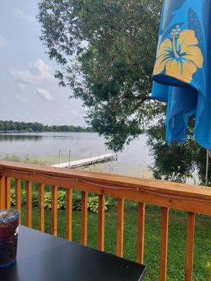 Lake view. Metal table is hot on a sunny day.