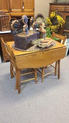 Perfect eat-in kitchen drop leaf table and two chairs.