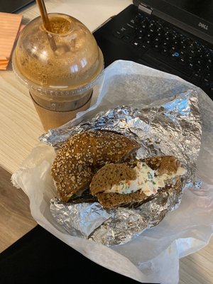 Greek frappe and wheat everything bagel with tofu vegetable cream cheese :)