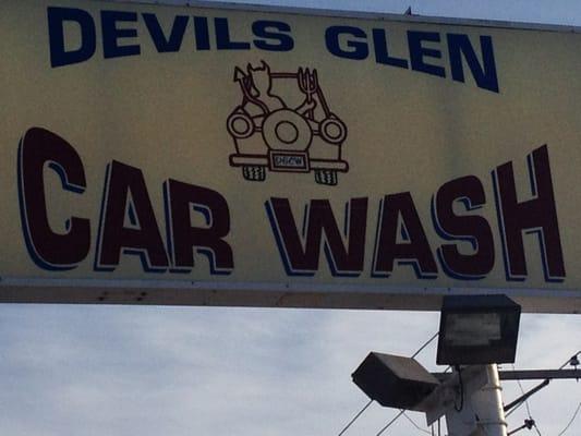 Street sign for Devils Glen Car Wash