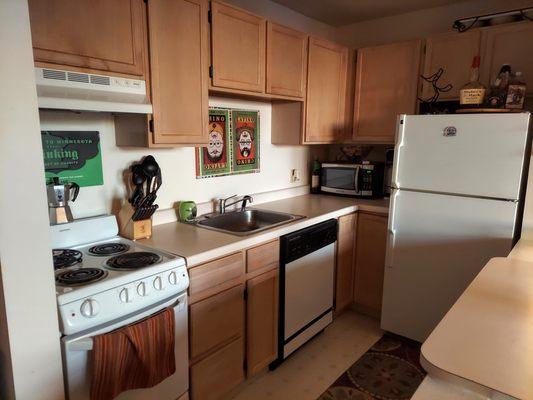 Little galley kitchen... but it felt bigger with the counter/table and opened into the rest of the space.