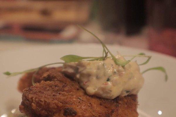 Mother's Crab cake with our Cajun remoulade  Garnivh micro cilantro