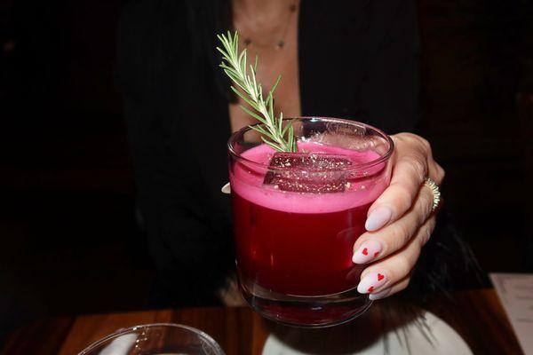 The Raices Profundas was made with La Luna Cupreata, Lejay Creme de Cassis, beet, lemon, rosemary, & egg white.