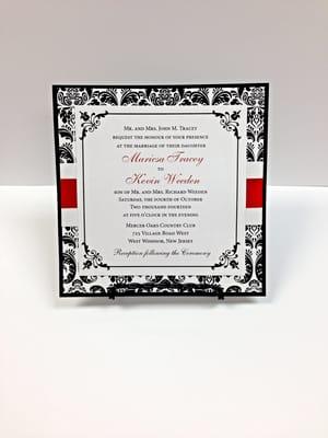 3 Layer Invitation. White Shimmer with black border icon on Damask and Black Backers, Red Satin Ribbon on Shimmer Band.