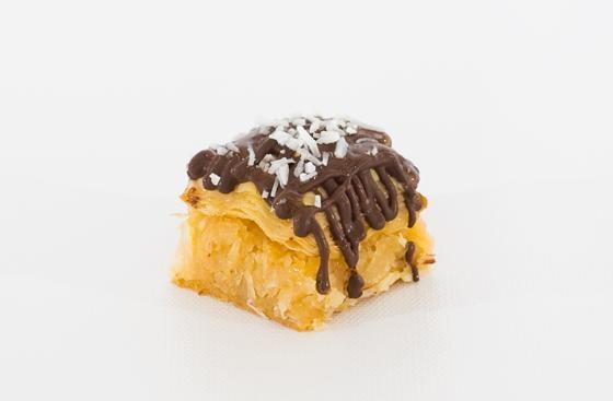 A close up of our Dark Chocolate Coconut Almond Baklava