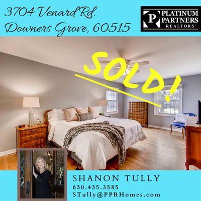 Happy clients completing a successful  sale of their staged home in Downers Grove!