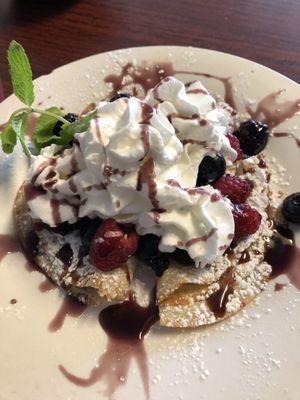 Blueberry raspberry crapes serve with bacon and eggs