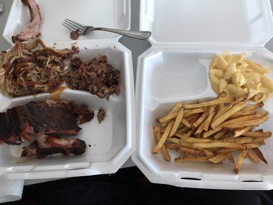 Ribs, pulled pork and chopped brisket with mac n cheese and fries