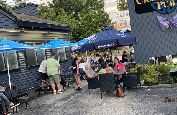 Outdoor patio now open. 14 tables with social distancing. Sanitization station outdoors and indoors.