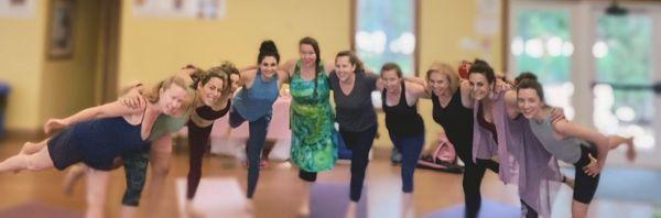 Our group enjoying a yoga class in our meeting room!