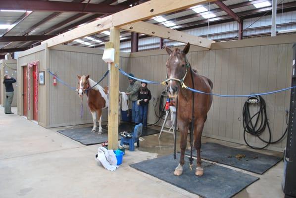 Two indoor hot/cold wash racks accompany the two outdoor wash racks