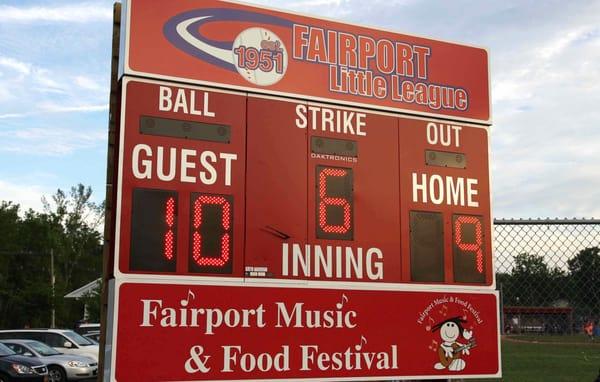 Parents control the score boards from the bleachers with a remote control.