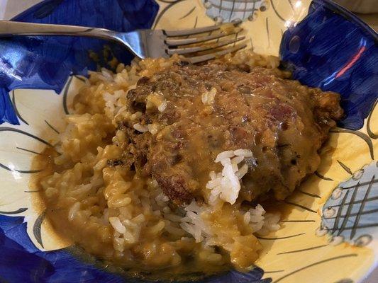 Roast pork egg foo young with gravy and white rice. Good stuff