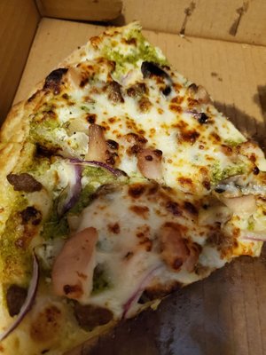 Last two slices 9f our pesto white sauce pizza