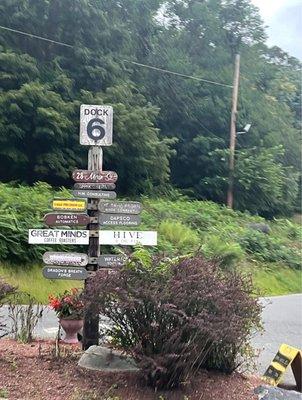 Street sign, it's a honey and farm store located in the historic pin shops