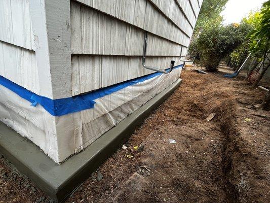 Working on this curb to stop water coming into the shed