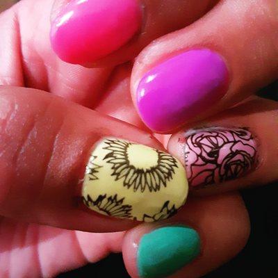 Colorful gel mani with nail art.