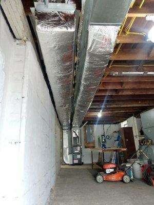 New insulated duct work in a garage