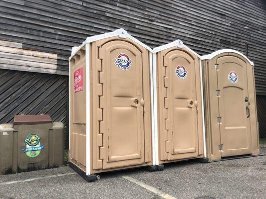 Portable toilet service and fryer oil collection tanks.