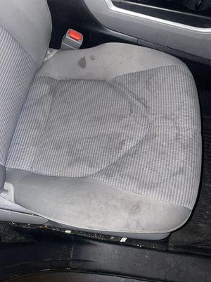 This is a cloth seat off a 2021 Toyota Highlander before the process