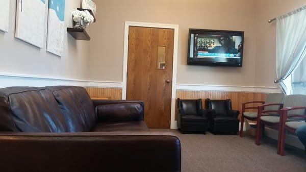 The waiting area.  Comfortable chairs and a TV!