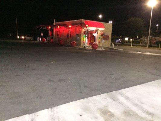 The car wash and vacuum station outside the store.