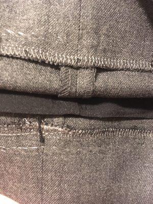 Insides of nicely hemmed lined wool pants.