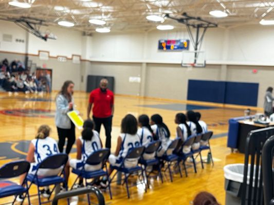 ford middle school coaches encouraging the 7th grade A team basketball team!