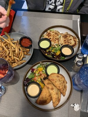 Fries, arepas(look like pancakes, empanadas.