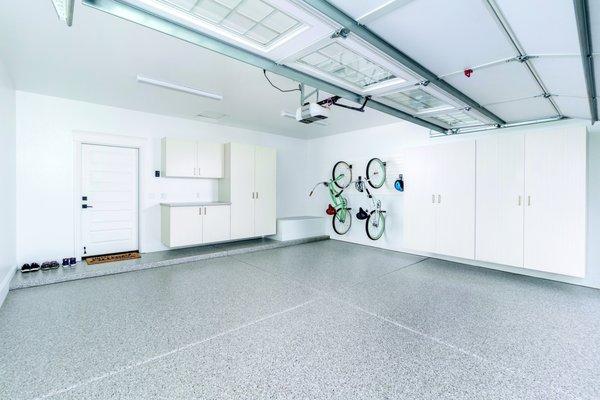 Garage flooring, cabinetry, and bike storage