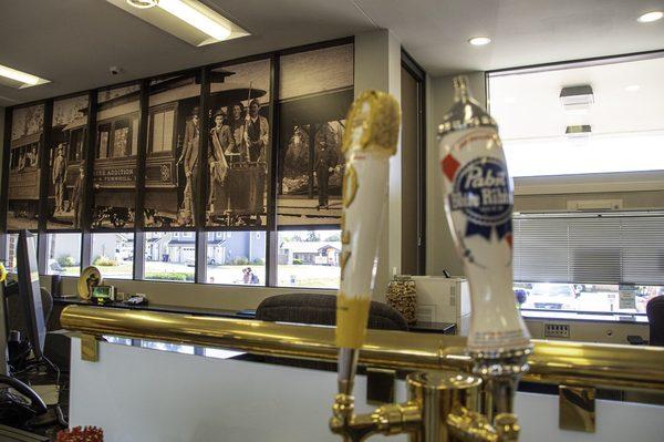 Beer taps along teller line.