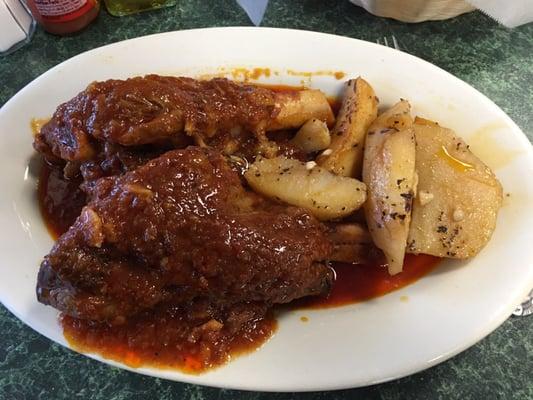 Lamb shanks with roast potatoes. So tender and flavorful !!Enough for 2 easily! Comes with soup or salad also.