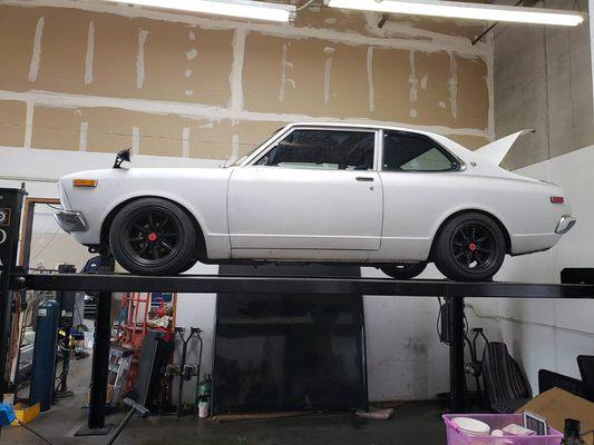 1972 Toyota Carina sitting on 15x8 0 off set Pisang matte black wheels