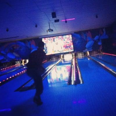 Cosmic bowling. I feel like a child, which isn't necessarily a bad thing. Note the drop-down TV screens! Nice touch.